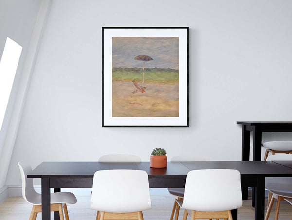 In riva al mare - Un'immagine di una sedia da spiaggia e un ombrellone posizionati sulla sabbia.