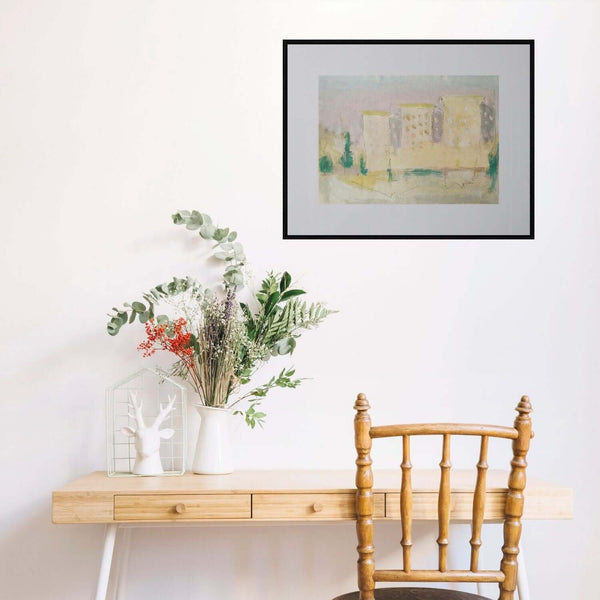 Palazzi di periferia - Immagine di una città con edifici e alberi che la abbelliscono.